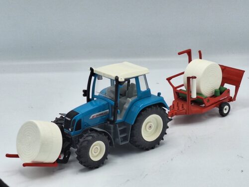 Fendt Farmer 412 Vario met Taarup Wikkelaar
